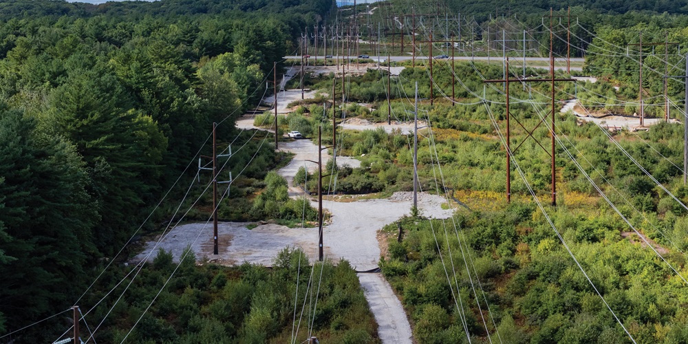 An aerial view of some of the transmission structure replacements Harlan Electric made along a 20-mile corridor in New Hampshire in 2022. Photo by Harlan Electric Co.