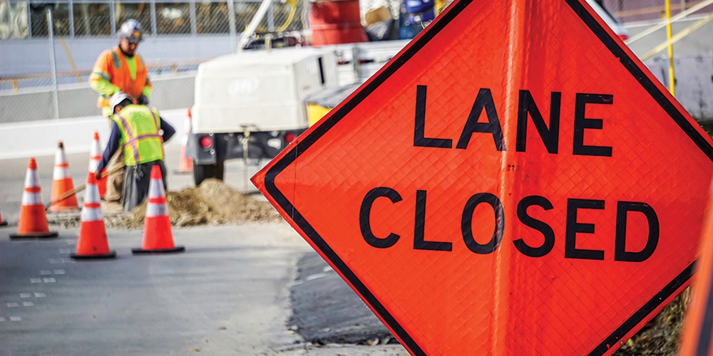 work zone with lane closed sign