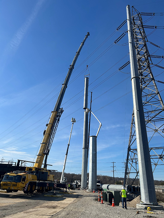 Fiberglass, steel and concrete can be used instead of wooden poles, although these materials are more costly. Photo by  Utility Supply and Construction Co.