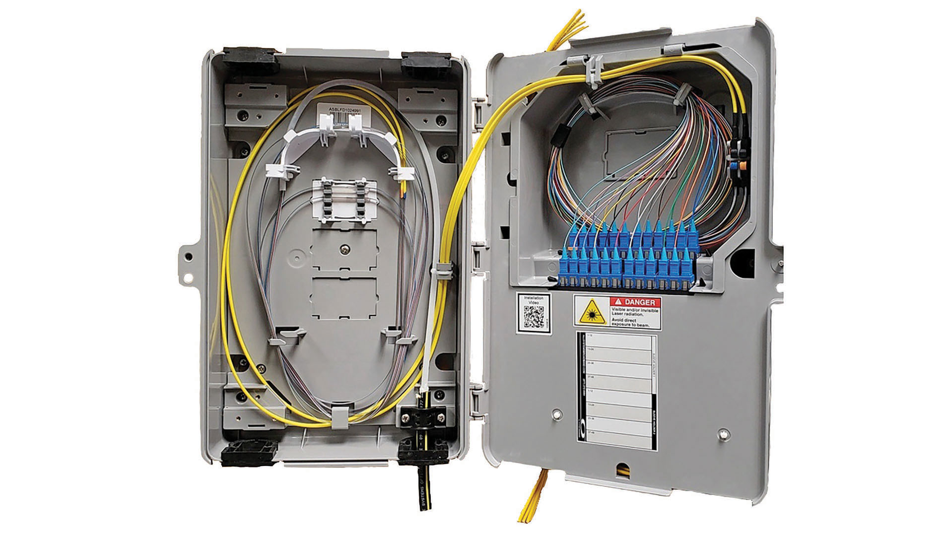Fiber optic cables in a gray enclosure. Image by Amphenol Network Solutions.