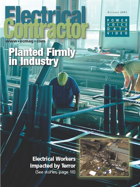 Electrical Contractor cover reading Planted Firmly in Industry with a photo of two workers around pipes.