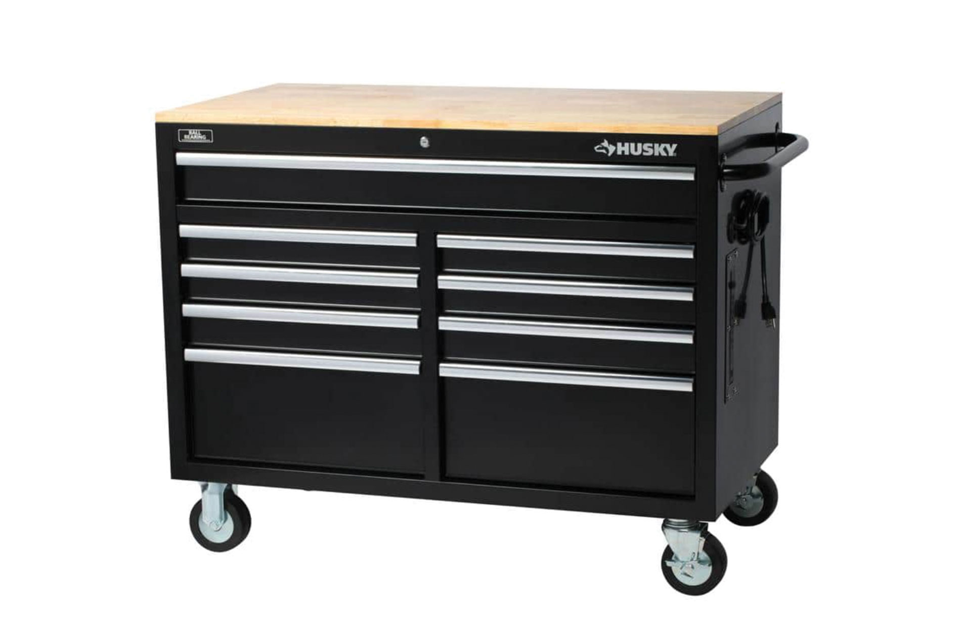 Black, nine-drawer workbench tool chest with wheels and oak top. Image by Husky.