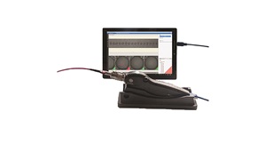 Black device with photos on a digital readout and a scope with a long, pointed tip. Image by Senko.