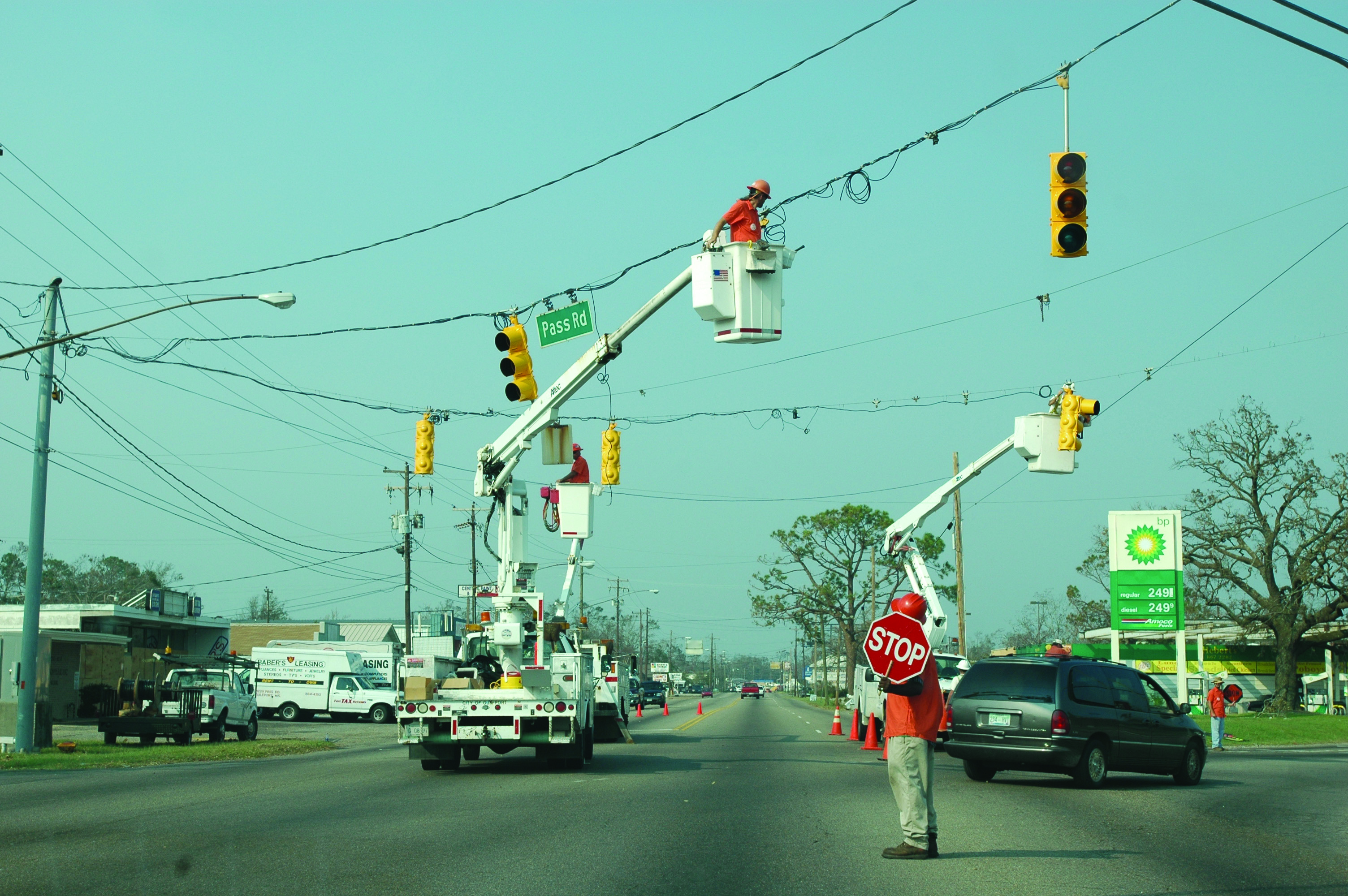 Gulfport, Miss., Sept. 5, 2005—Technicians work to repair traffic lights in Gulfport. Hurricane Katrina caused extensive damage all along the Mississippi Gulf Coast. | Photo by FEMA/MARK WOLFE
