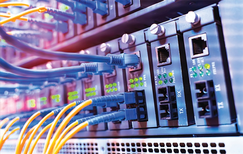 Ethernet cables plugged into a communications system