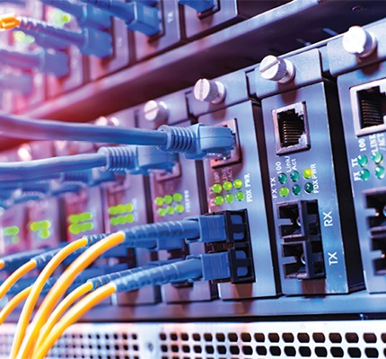 Ethernet cables plugged into a communications system