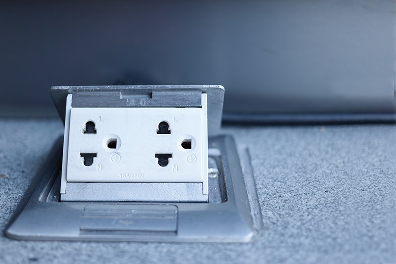 A pop-up receptacle for a counter surface