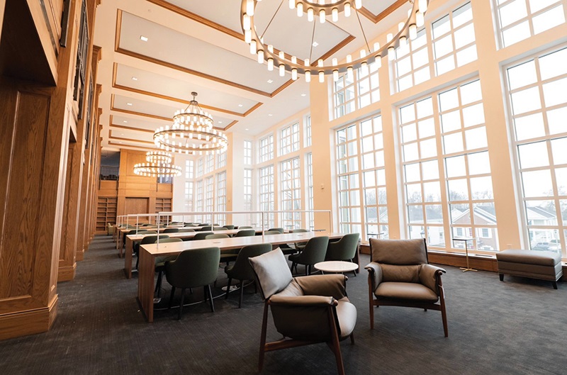 A new lighting system illuminates one of the new glass-enclosed reading rooms at the DePauw University library.