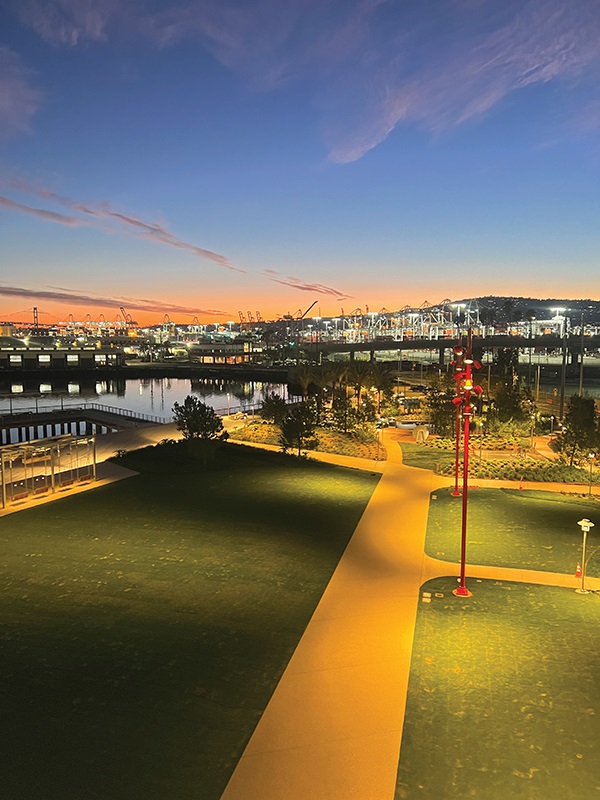 An aerial view of the completed Wilmington Waterfront Promenade, with Elecnor Belco’s lighting and electrical work illuminating the landscape