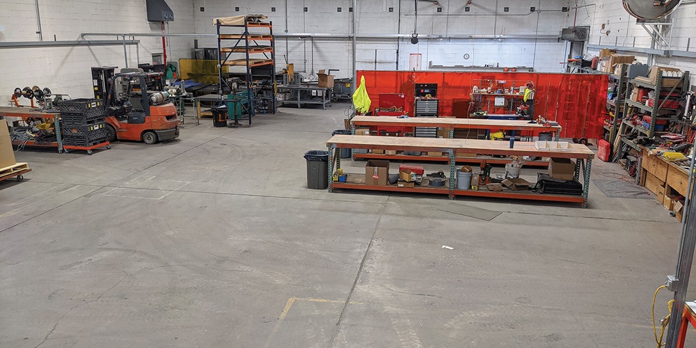 The prefab shop at Lake Erie Electric of Toledo Inc. includes two 16-foot assembly tables, a plasma table and a welding and metal fabrication area. | Shutterstock / MiaTunaSaray / Lake Erie Electric of Toledo Inc.