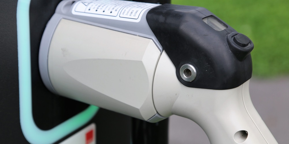 Plug for electric car charging station