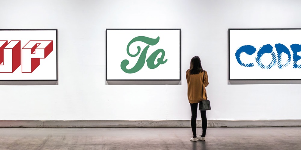 A woman stands in front of three words framed on a wall: "Up," "To" and "Code." | Shutterstock / Think A