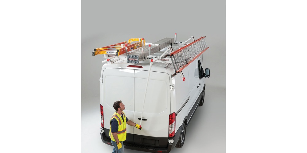 Truck uplift with slide-down rooftop racks to carry ladders.