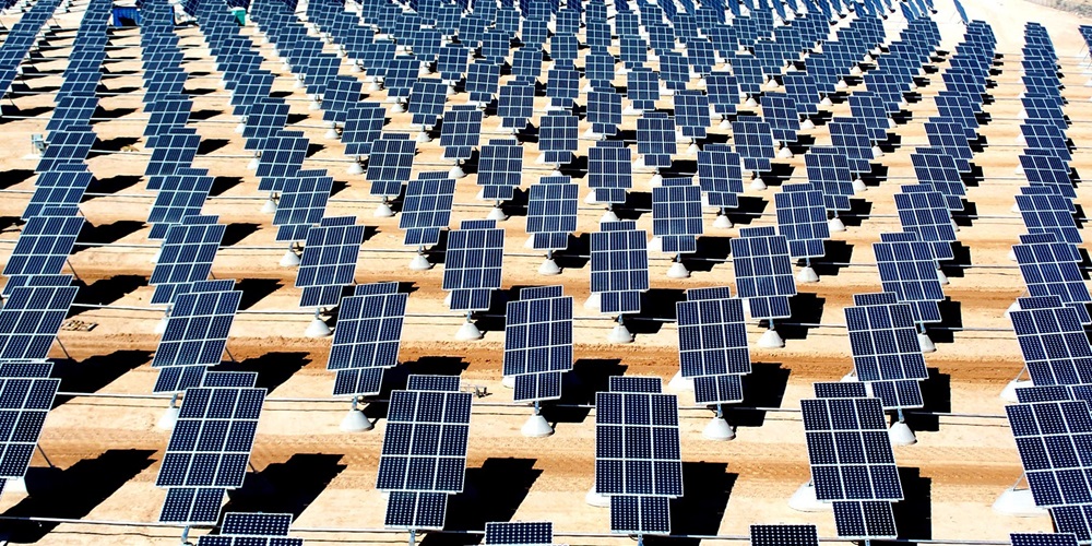 Solar Power Panels in Desert Image by David Mark from Pixabay