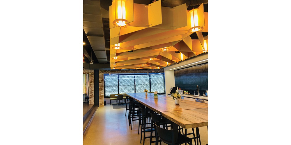 This acoustic lighting fixture in NECA's Washington, D.C., office lunchroom helps soften sound and reduce reverberations. | Andrea Klee