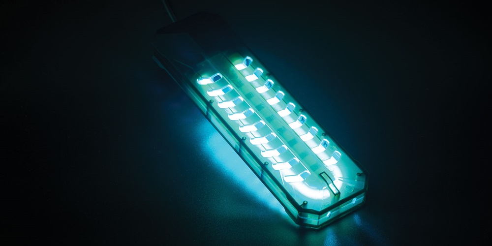 Germicidal UV lamp glowing blue-green | Shutterstock / Nor Gal