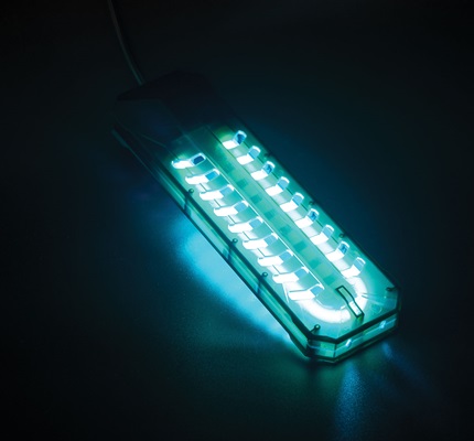 Germicidal UV lamp glowing blue-green | Shutterstock / Nor Gal