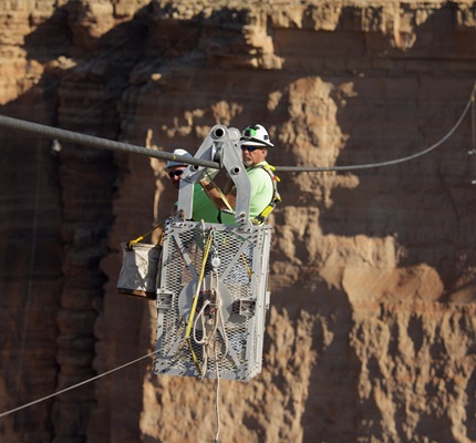 Electricians, Tightrope Walker Team Up For High-Wire Act