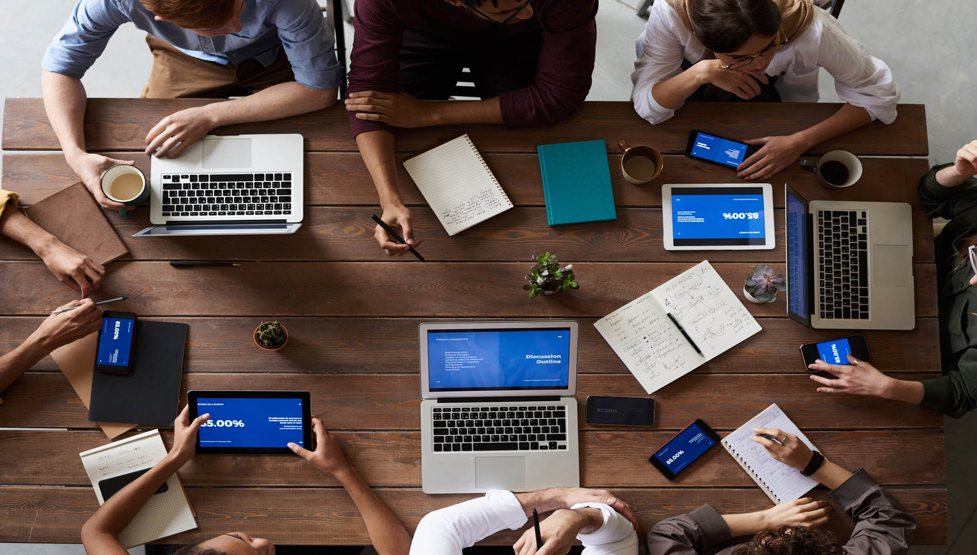 top-view-photo-of-people-near-wooden-table-3183150.jpg Training