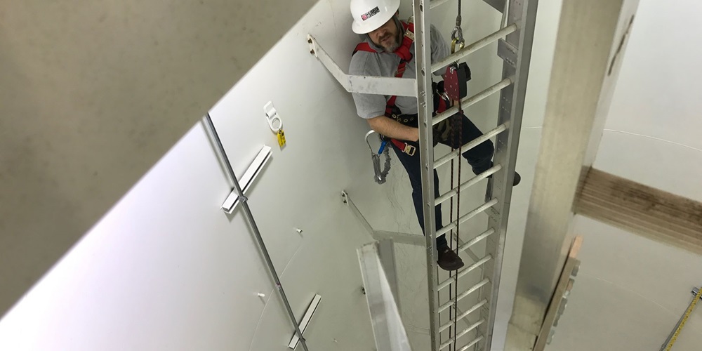 IBEW-NECA apprentice in tower1.jpg
