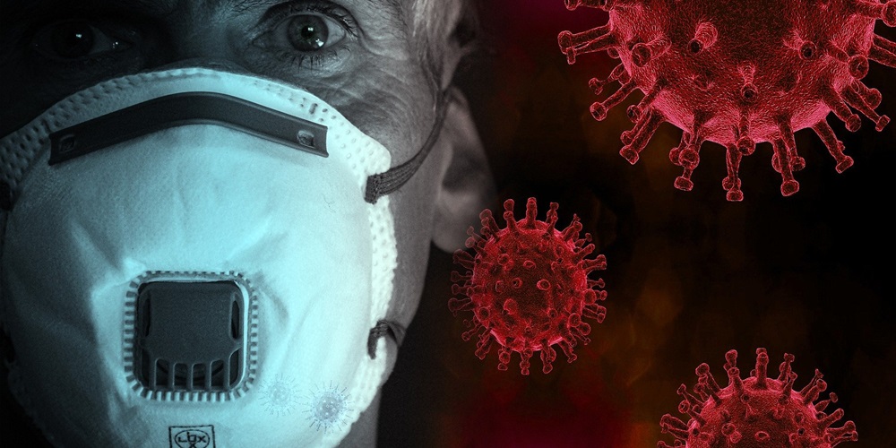 Man with N95 mask against a background of coronavirus