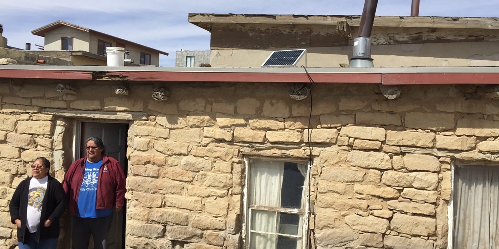 A solar panel installed on the roof of a home in a Hopi village. | Living Energy Farm