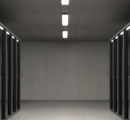 Rows of servers behind glass doors in a data center