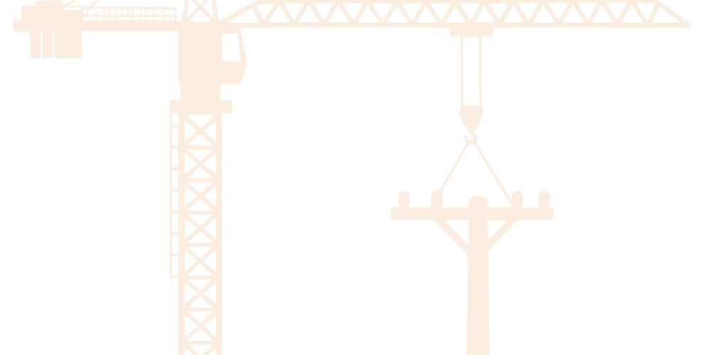 A large crane puts a utility pole into place