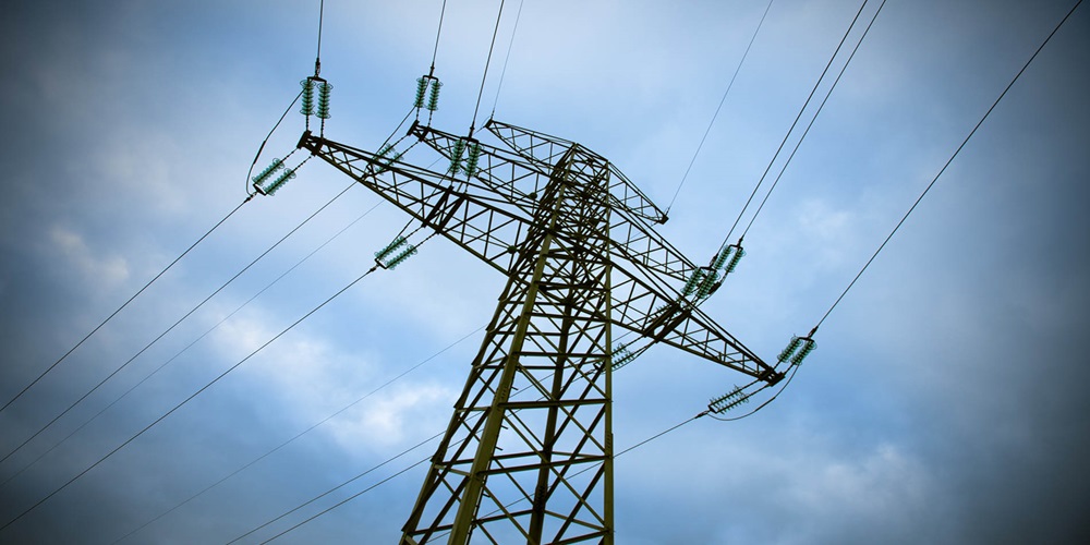 transmission tower against a blue sky