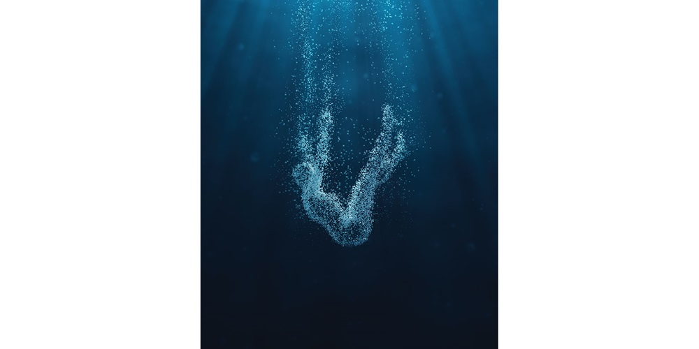 Person sinking to bottom of dark space