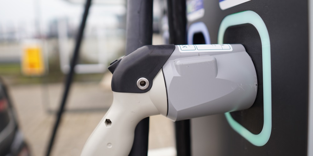 Public electric vehicle (EV) charger, EV charging infrastructure, EV charging port