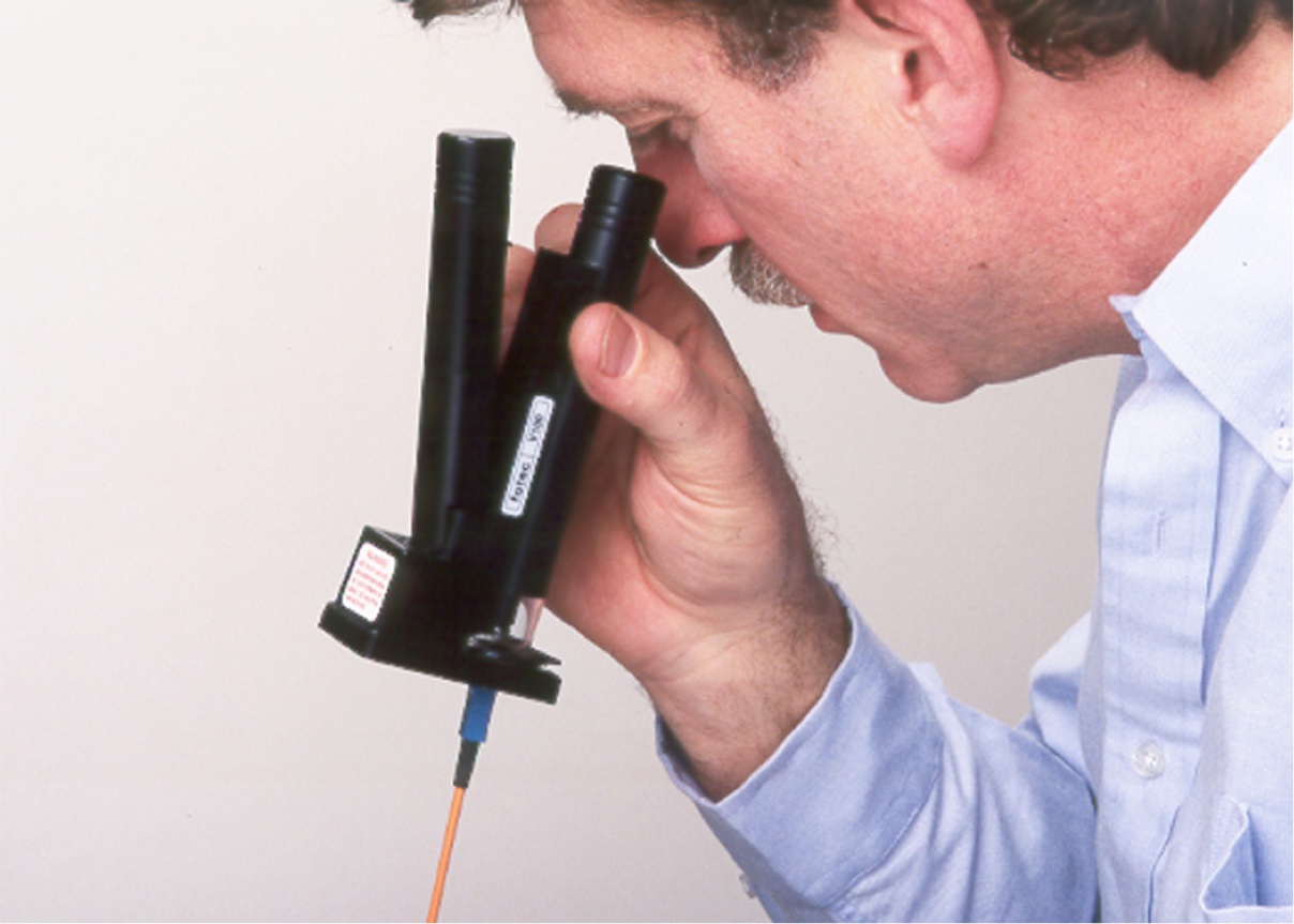 Modified Panasonic Fiber Optic Microscope, FOTEC V100 circa 1985, being used to inspect a fiber optic connection