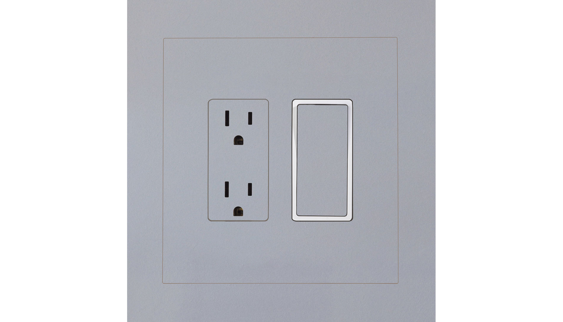 Gray inset outlet and switch covers. Image by Hide-A-Trim.