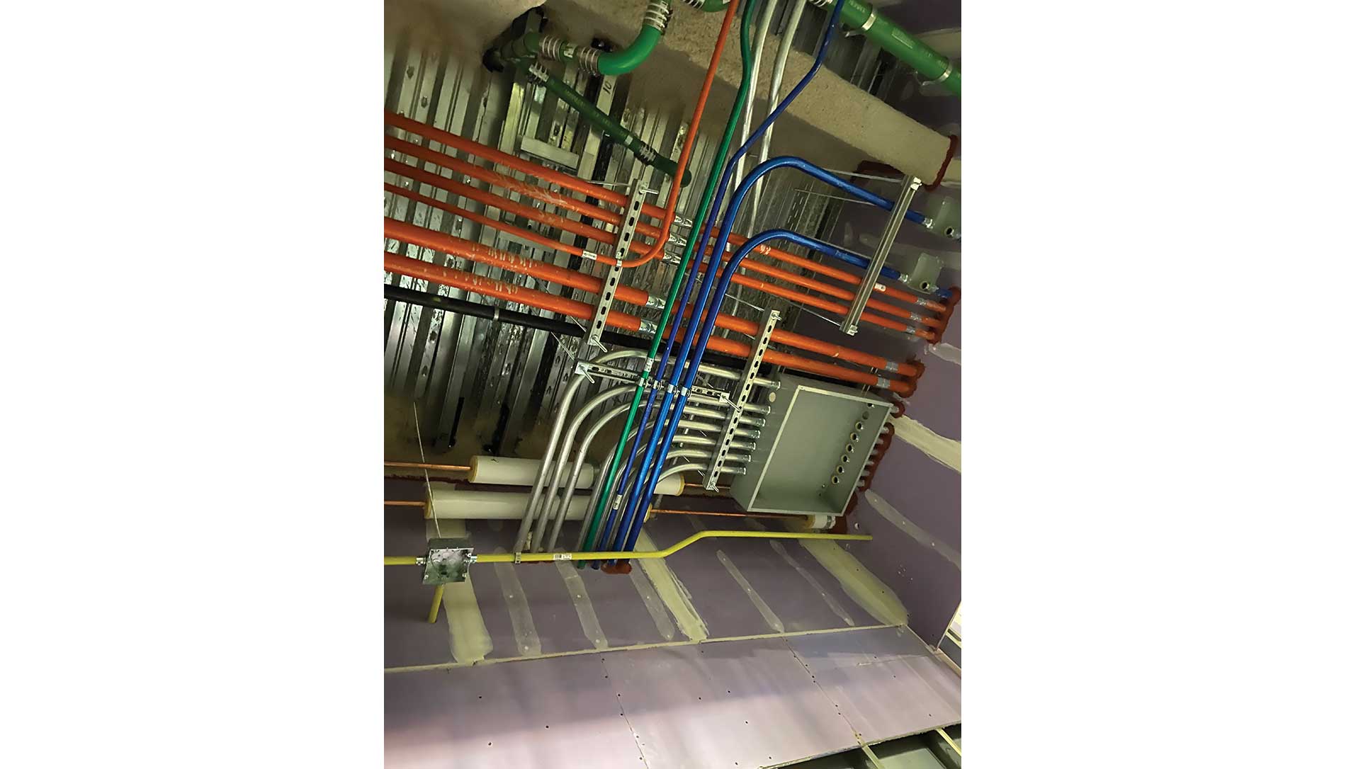 Multicolored conduits. Image by Cannon & Wendt.