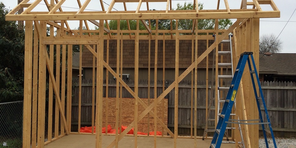 ladder in front of house being built