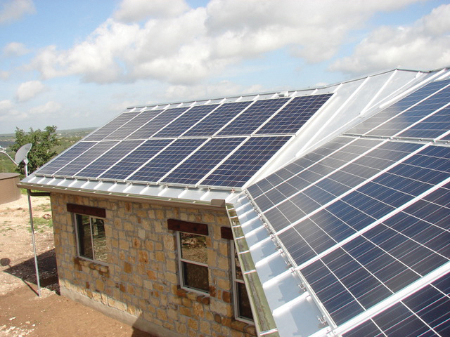 Solar panels can be added to new or existing homes to power EV chargers and other systems. Photo by Zero-Energy Home Plans