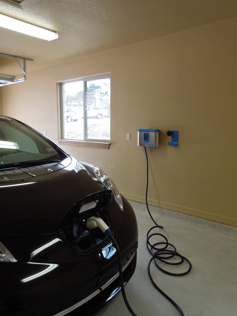 Multiple EV chargers can be installed in a new garage with the proper wiring. Photo by Zero-Energy Home Plans
