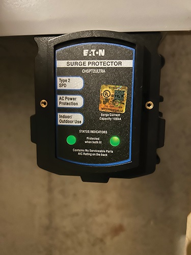 For surge protective devices (SPDs) in dwellings, the 2023 NEC requires that the SPD must have a nominal discharge current rating of not less than 10 kA.