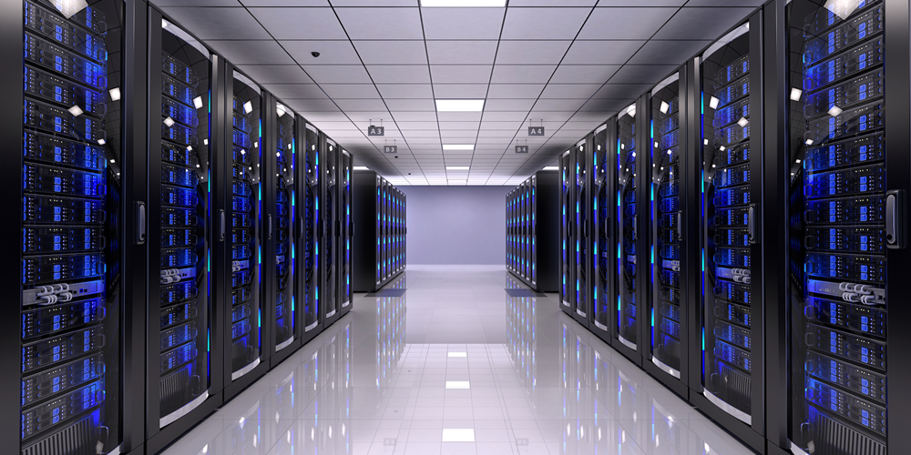 Two long rows of black servers with blue lights. Image by Champion Fiberglass®.