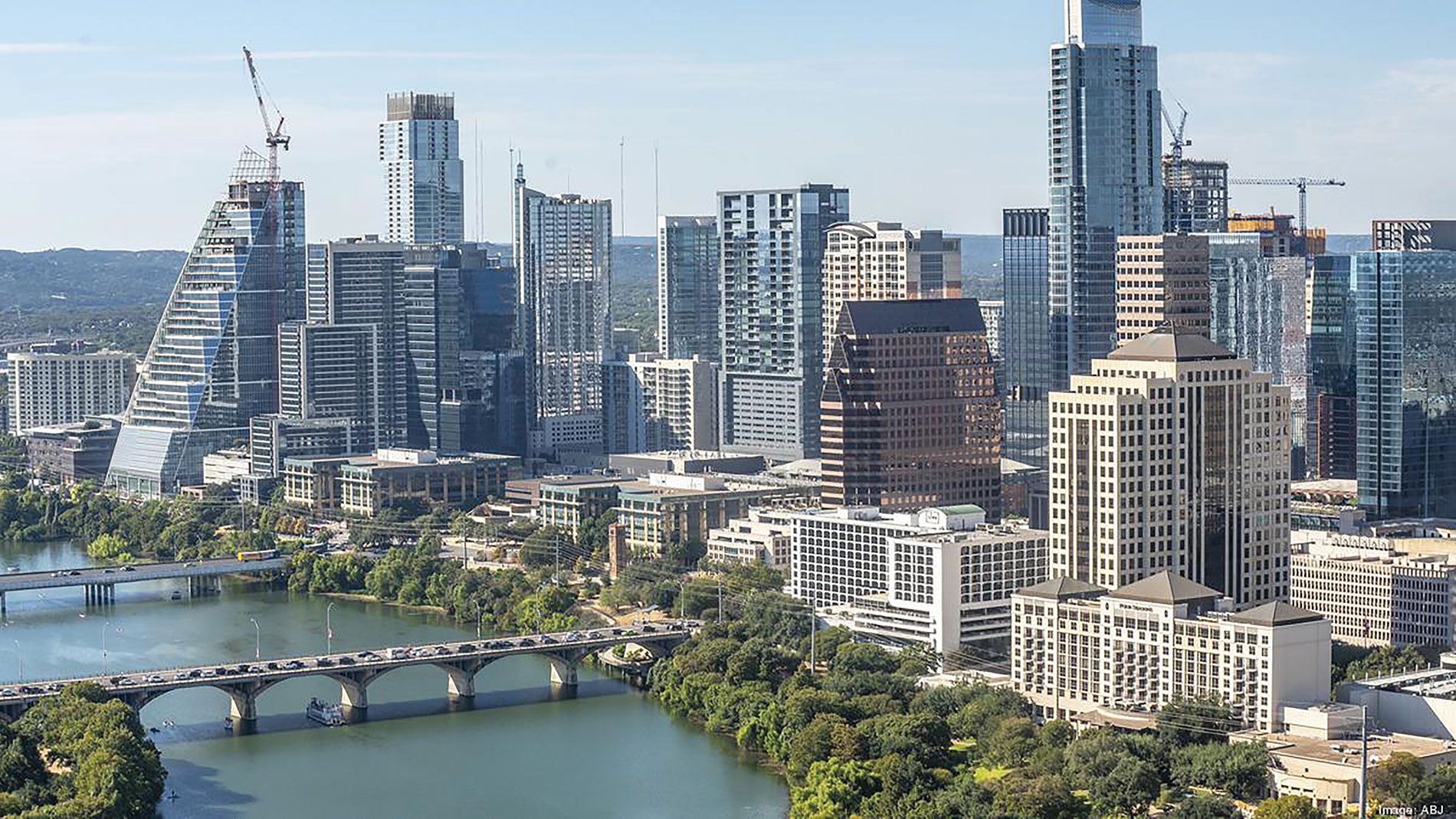 Austin skyline by a river. Image by IBI Group, Inc.