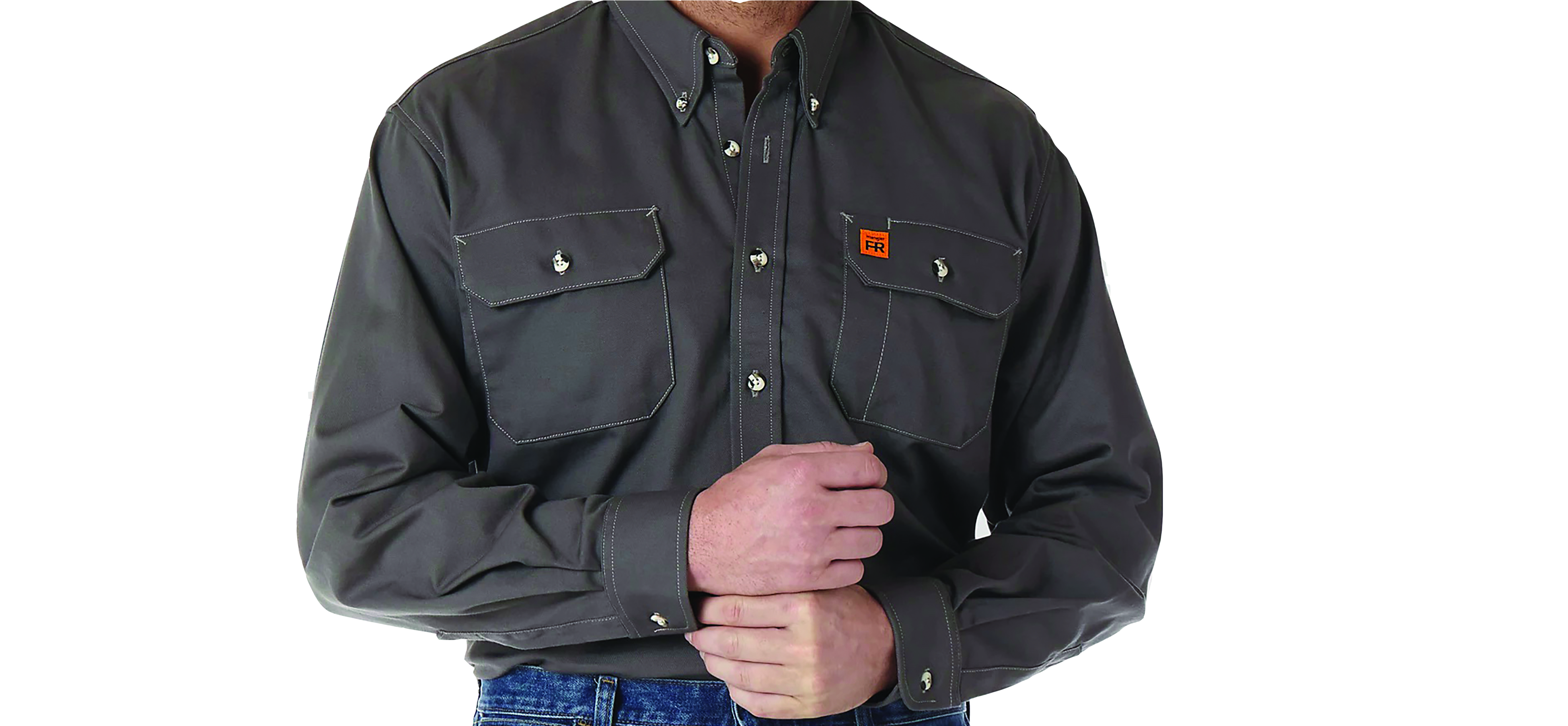 A person wearing a brown long-sleeved button-up shirt with jeans. Image by Wrangler.