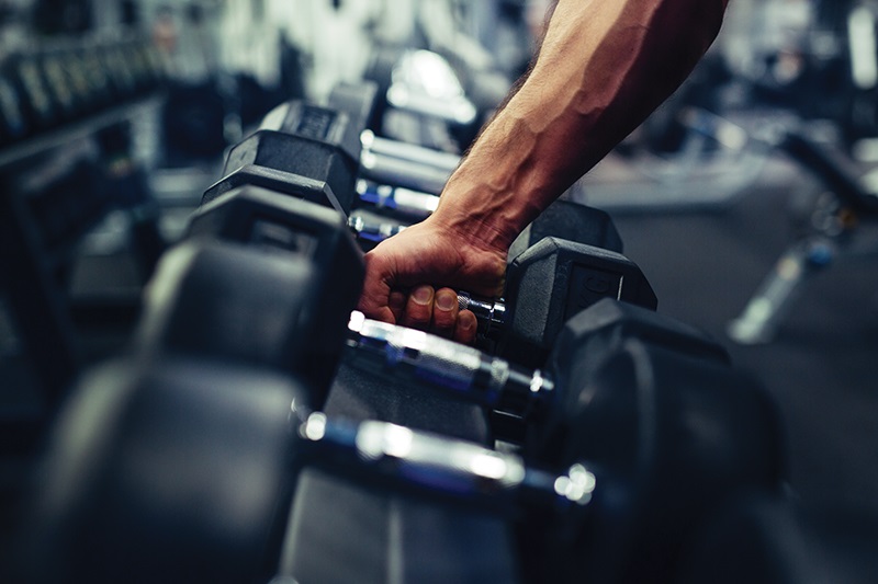 arm reaching for weights