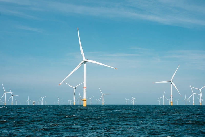 Five offshore wind farm projects along the U.S. East Coast successfully overcame legal hurdles and have resumed construction or are fully operational. Photo by Jesse De Meulenaere on Unsplash.