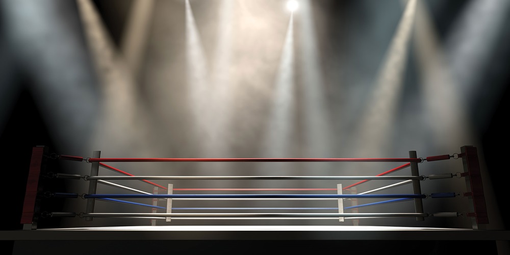 2022 Construction Outlook | Illustration of a spotlit boxing ring. Image by Shutterstock / Inked Pixels.