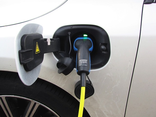 Plugged in EV. Image by (Joenomias) Menno de Jong from Pixabay