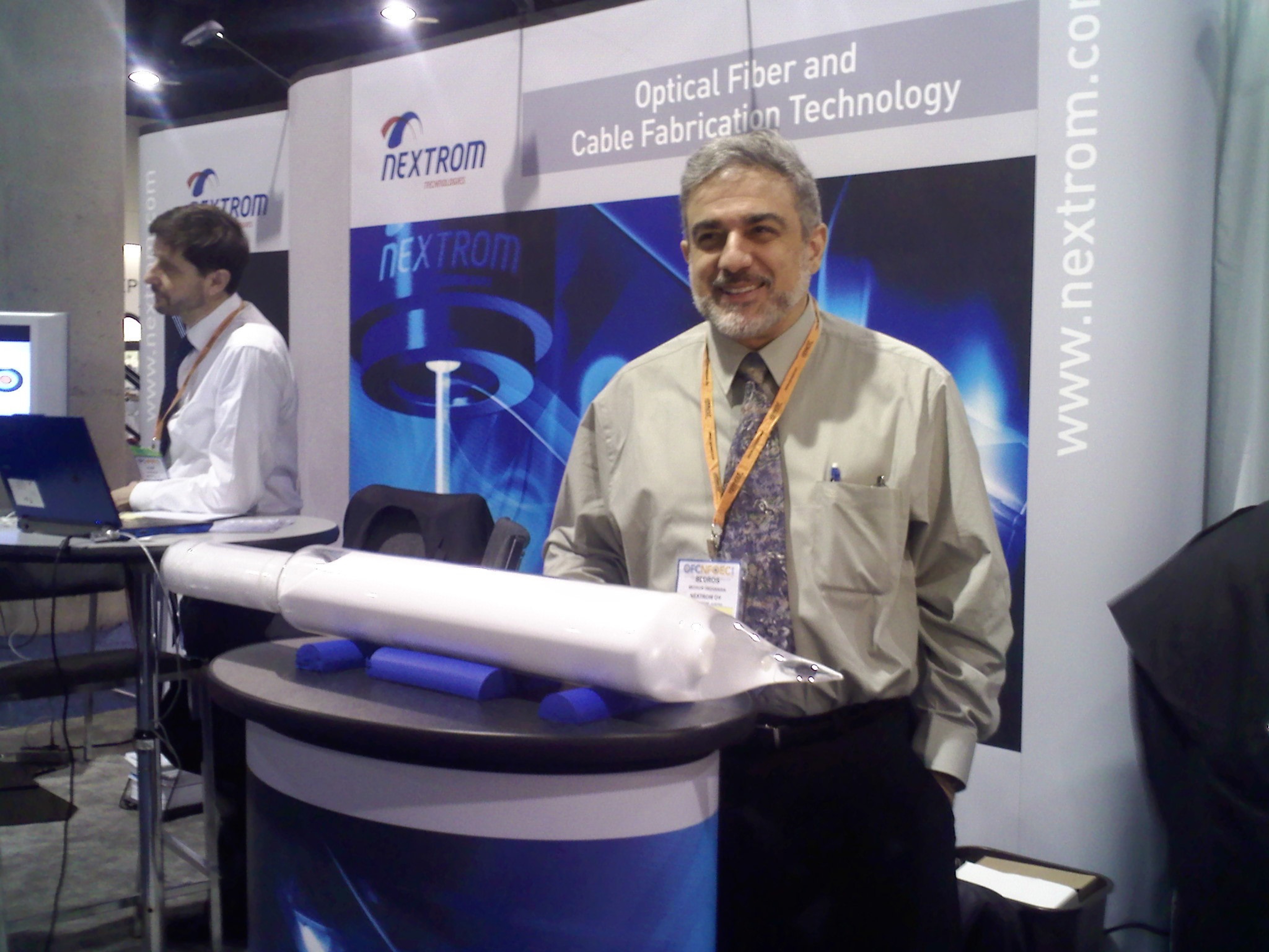 Fiber optic preform on display at a trade show