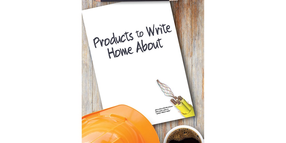 Notepad titled Products to Write Home About with a hard hat and coffee. Image by Shutterstock / Triple_D Studio.