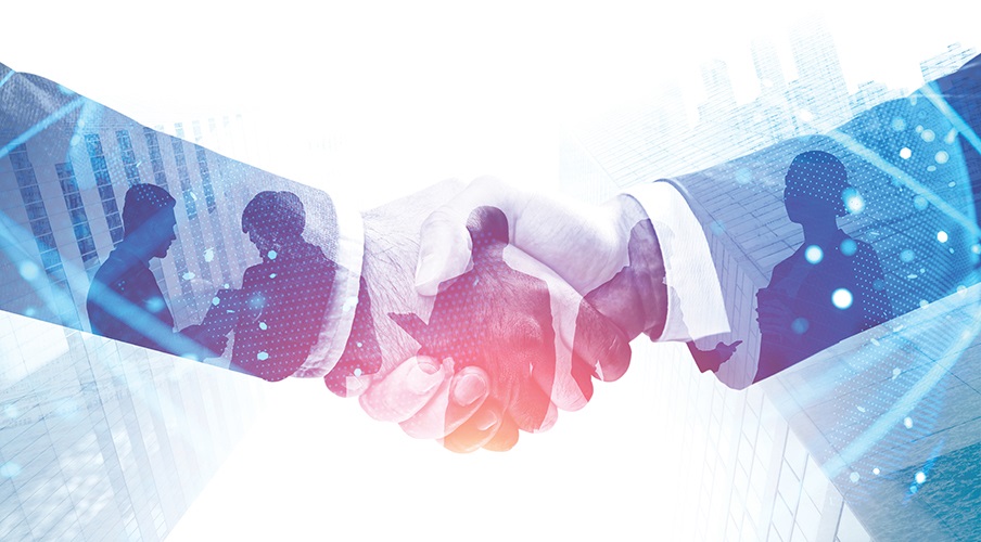 Two hands shaking, representing partnership between electrical contractors and their suppliers