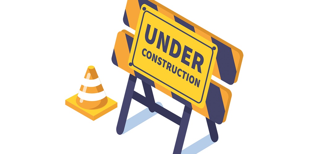 Illustration of a road sign reading Under Construction. Image by Shutterstock / Irina Strelnikova.