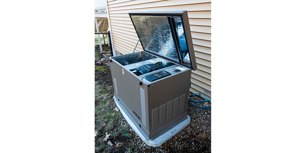 Photo of a backup generator outside a building. Image by Shutterstock / Steven Phraner.